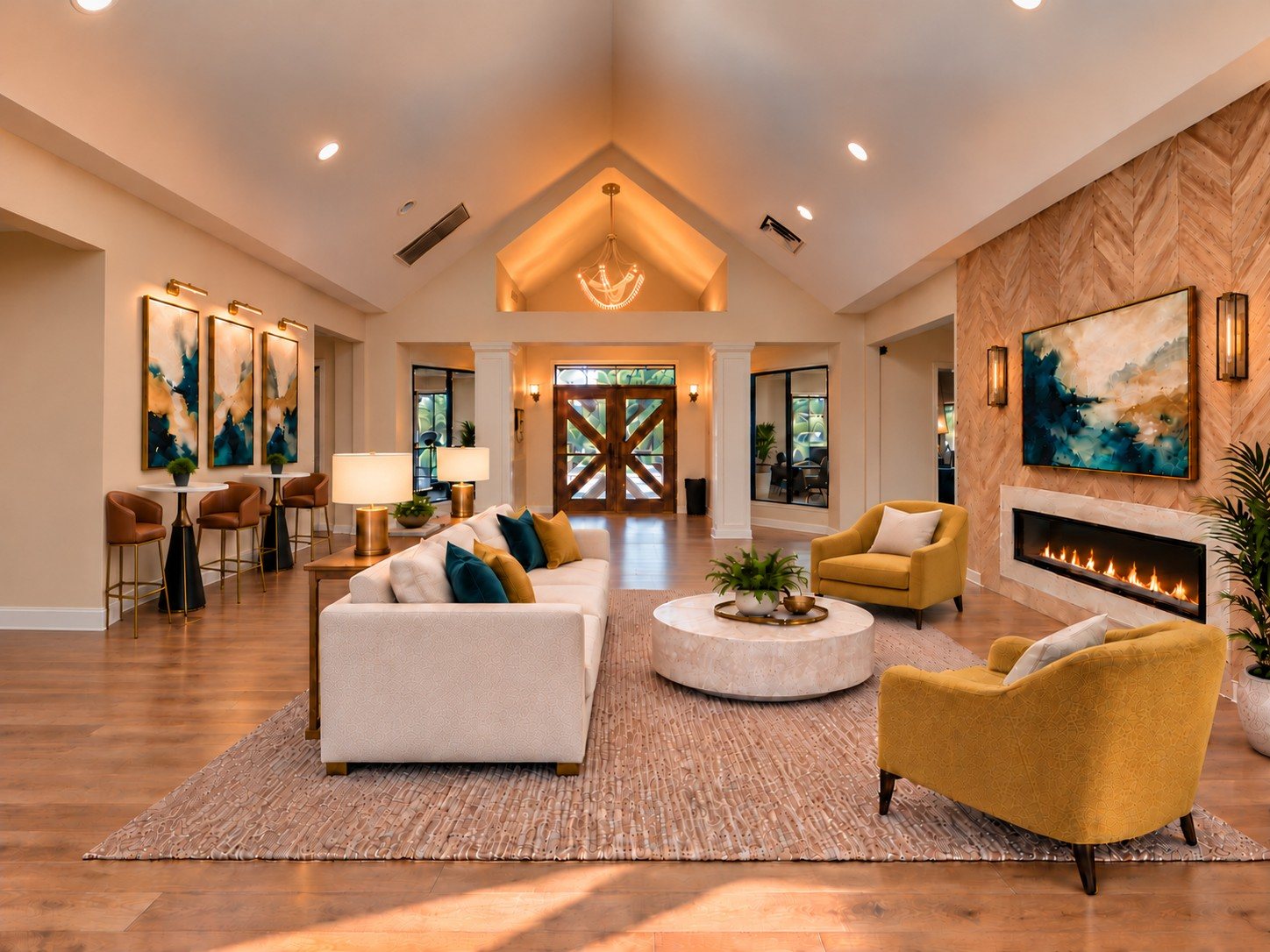After: the redesigned lounge with herringbone wall, fireplace, ivory sofa and mustard chairs