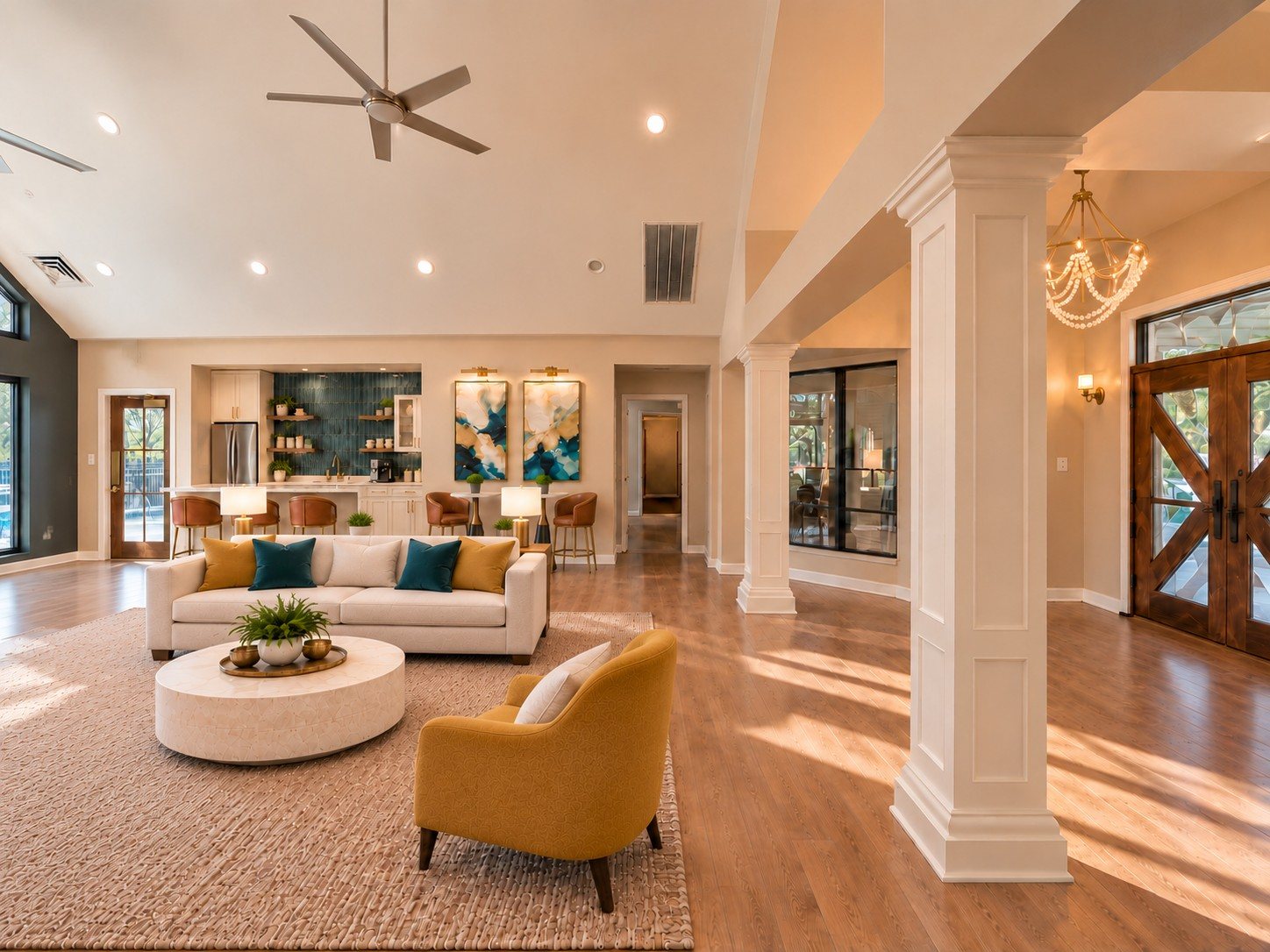 The redesigned clubhouse lounge with vaulted ceiling, walnut double doors and teal and mustard accents